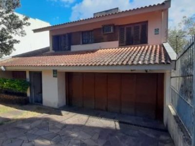 Casa à venda com 261m², 3 quartos, 1 suíte, 4 vagas no bairro Cristal em Porto Alegre - Foto 2