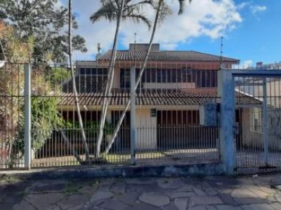 Casa à venda com 261m², 3 quartos, 1 suíte, 4 vagas no bairro Cristal em Porto Alegre - Foto 3