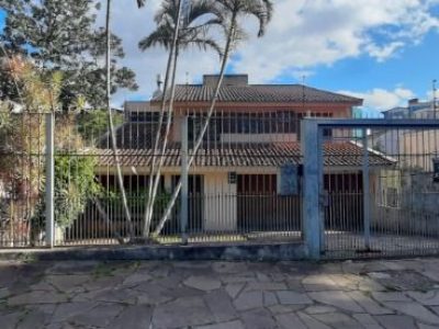 Casa à venda com 261m², 3 quartos, 1 suíte, 4 vagas no bairro Cristal em Porto Alegre - Foto 4