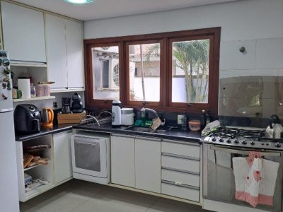 Casa à venda com 200m², 3 quartos, 1 suíte, 4 vagas no bairro Sarandi em Porto Alegre - Foto 18