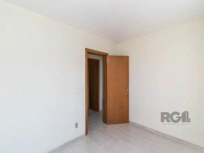 Apartamento à venda com 68m², 2 quartos, 1 suíte, 2 vagas no bairro Jardim Itu em Porto Alegre - Foto 4