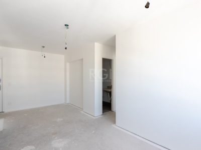 Apartamento à venda com 54m², 2 quartos, 1 suíte, 1 vaga no bairro Jardim Lindóia em Porto Alegre - Foto 4