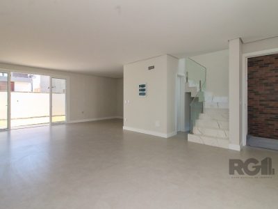 Casa Condominio à venda com 209m², 3 quartos, 3 suítes, 2 vagas no bairro Ipanema em Porto Alegre - Foto 9