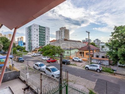 Casa à venda com 381m², 5 quartos, 2 suítes, 2 vagas no bairro Partenon em Porto Alegre - Foto 8