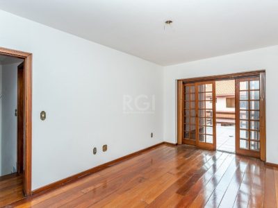 Casa à venda com 381m², 5 quartos, 2 suítes, 2 vagas no bairro Partenon em Porto Alegre - Foto 5