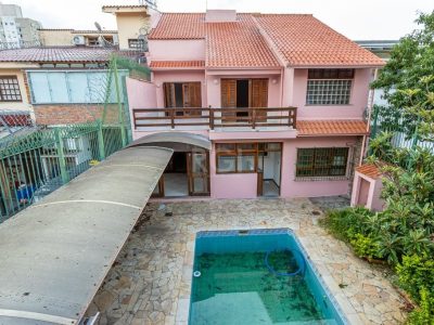 Casa à venda com 381m², 5 quartos, 2 suítes, 2 vagas no bairro Partenon em Porto Alegre - Foto 47