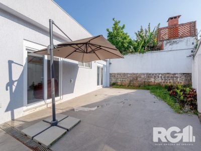 Casa à venda com 400m², 3 quartos, 3 suítes, 3 vagas no bairro Três Figueiras em Porto Alegre - Foto 30