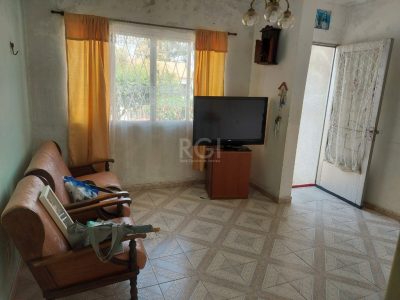 Casa à venda com 66m², 2 quartos, 2 vagas no bairro Santa Tereza em Porto Alegre - Foto 7