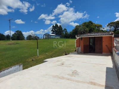 Casa à venda com 66m², 2 quartos, 2 vagas no bairro Santa Tereza em Porto Alegre - Foto 16