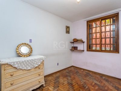 Casa à venda com 197m², 5 quartos, 1 suíte, 2 vagas no bairro Jardim Botânico em Porto Alegre - Foto 9