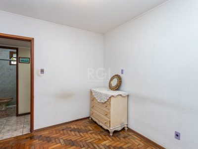 Casa à venda com 197m², 5 quartos, 1 suíte, 2 vagas no bairro Jardim Botânico em Porto Alegre - Foto 11