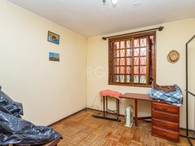 Casa à venda com 197m², 5 quartos, 1 suíte, 2 vagas no bairro Jardim Botânico em Porto Alegre - Foto 15