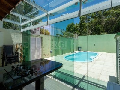 Casa à venda com 222m², 3 quartos, 1 suíte, 4 vagas no bairro Ipanema em Porto Alegre - Foto 15