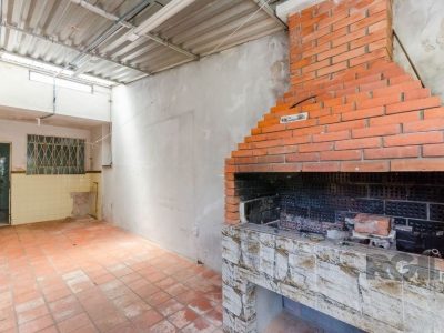 Casa à venda com 318m², 3 quartos, 3 vagas no bairro Santa Tereza em Porto Alegre - Foto 22