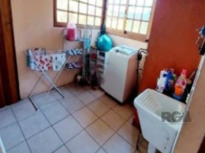 Casa à venda com 200m², 5 quartos, 1 suíte, 2 vagas no bairro Jardim Itu em Porto Alegre - Foto 8