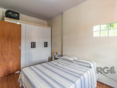 Casa à venda com 297m², 3 quartos, 3 vagas no bairro Santa Tereza em Porto Alegre - Foto 10