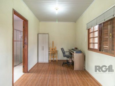 Casa à venda com 297m², 3 quartos, 3 vagas no bairro Santa Tereza em Porto Alegre - Foto 23