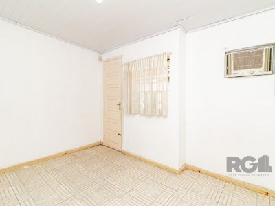 Casa à venda com 160m², 3 quartos, 1 suíte, 4 vagas no bairro Vila Ipiranga em Porto Alegre - Foto 9