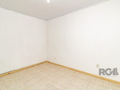 Casa à venda com 160m², 3 quartos, 1 suíte, 4 vagas no bairro Vila Ipiranga em Porto Alegre - Foto 11