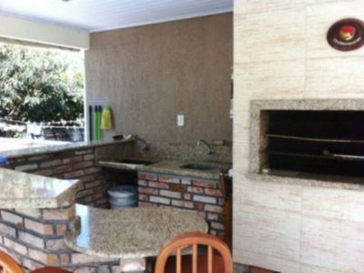 Casa à venda com 200m², 3 quartos, 1 suíte, 2 vagas no bairro Tristeza em Porto Alegre - Foto 34