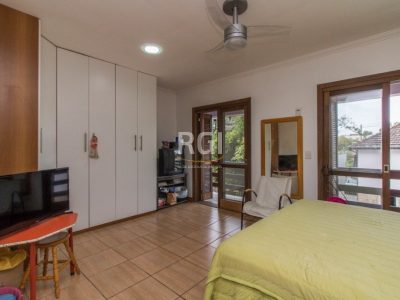 Casa à venda com 396m², 5 quartos, 2 suítes, 5 vagas no bairro Santo Antônio em Porto Alegre - Foto 19