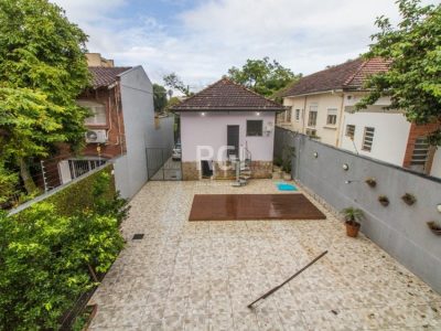 Casa à venda com 396m², 5 quartos, 2 suítes, 5 vagas no bairro Santo Antônio em Porto Alegre - Foto 22