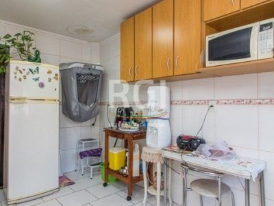 Casa à venda com 396m², 5 quartos, 2 suítes, 5 vagas no bairro Santo Antônio em Porto Alegre - Foto 25