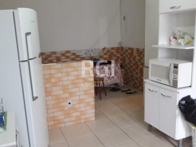 Casa à venda com 90m², 4 quartos, 3 vagas no bairro Cristal em Porto Alegre - Foto 8