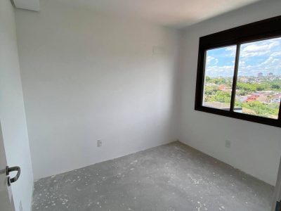 Apartamento à venda com 62m², 2 quartos, 1 suíte, 1 vaga no bairro Jardim do Salso em Porto Alegre - Foto 9