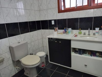 Casa à venda com 170m², 3 quartos, 1 suíte, 2 vagas no bairro Jardim Lindóia em Porto Alegre - Foto 12