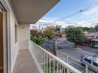 Casa à venda com 138m², 4 quartos, 1 suíte, 3 vagas no bairro Santo Antônio em Porto Alegre - Foto 34