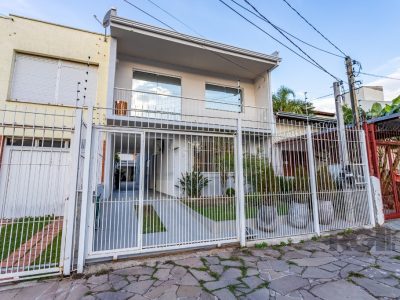 Casa à venda com 138m², 4 quartos, 1 suíte, 3 vagas no bairro Santo Antônio em Porto Alegre - Foto 57