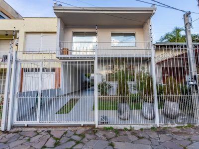 Casa à venda com 138m², 4 quartos, 1 suíte, 3 vagas no bairro Santo Antônio em Porto Alegre - Foto 58