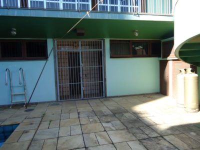 Casa à venda com 485m², 4 quartos, 2 suítes, 6 vagas no bairro Chácara das Pedras em Porto Alegre - Foto 11