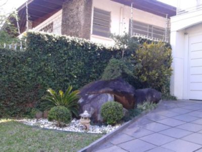 Casa à venda com 450m², 3 quartos, 3 suítes, 6 vagas no bairro Três Figueiras em Porto Alegre - Foto 2