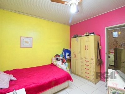 Casa à venda com 100m², 5 quartos, 1 vaga no bairro Santo Antônio em Porto Alegre - Foto 15