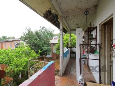 Casa à venda com 100m², 5 quartos, 1 vaga no bairro Santo Antônio em Porto Alegre - Foto 18