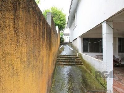 Casa à venda com 100m², 5 quartos, 1 vaga no bairro Santo Antônio em Porto Alegre - Foto 21