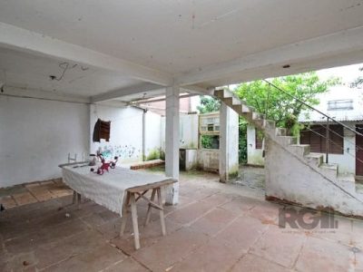 Casa à venda com 100m², 5 quartos, 1 vaga no bairro Santo Antônio em Porto Alegre - Foto 23