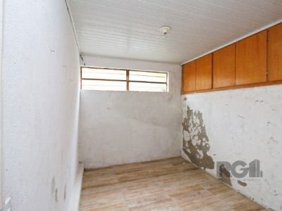 Casa à venda com 100m², 5 quartos, 1 vaga no bairro Santo Antônio em Porto Alegre - Foto 24