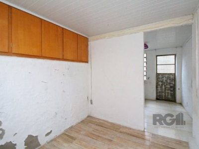 Casa à venda com 100m², 5 quartos, 1 vaga no bairro Santo Antônio em Porto Alegre - Foto 25