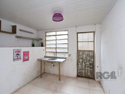 Casa à venda com 100m², 5 quartos, 1 vaga no bairro Santo Antônio em Porto Alegre - Foto 26