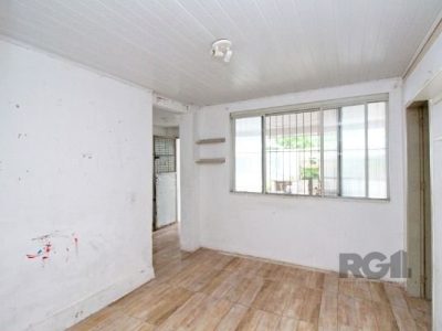 Casa à venda com 100m², 5 quartos, 1 vaga no bairro Santo Antônio em Porto Alegre - Foto 27