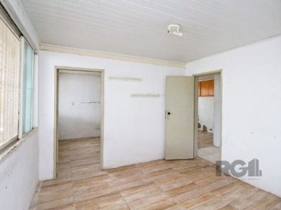 Casa à venda com 100m², 5 quartos, 1 vaga no bairro Santo Antônio em Porto Alegre - Foto 28