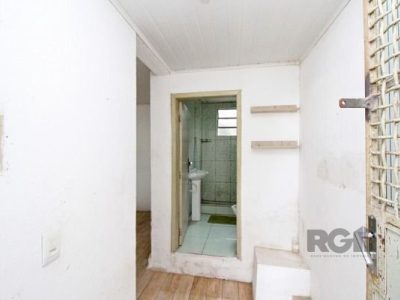 Casa à venda com 100m², 5 quartos, 1 vaga no bairro Santo Antônio em Porto Alegre - Foto 29