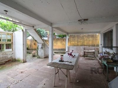 Casa à venda com 100m², 5 quartos, 1 vaga no bairro Santo Antônio em Porto Alegre - Foto 31