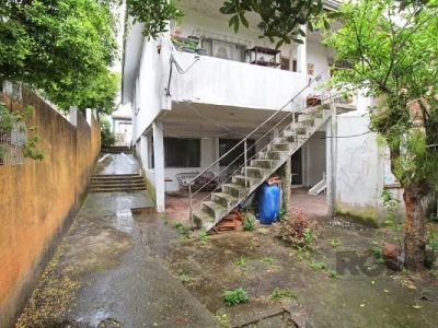 Casa à venda com 100m², 5 quartos, 1 vaga no bairro Santo Antônio em Porto Alegre - Foto 32