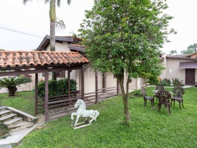 Casa à venda com 380m², 3 quartos, 1 suíte, 3 vagas no bairro Tristeza em Porto Alegre - Foto 2