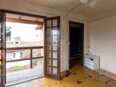 Casa à venda com 380m², 3 quartos, 1 suíte, 3 vagas no bairro Tristeza em Porto Alegre - Foto 36