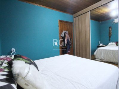 Casa à venda com 416m², 3 quartos, 1 suíte, 3 vagas no bairro Jardim Lindóia em Porto Alegre - Foto 16